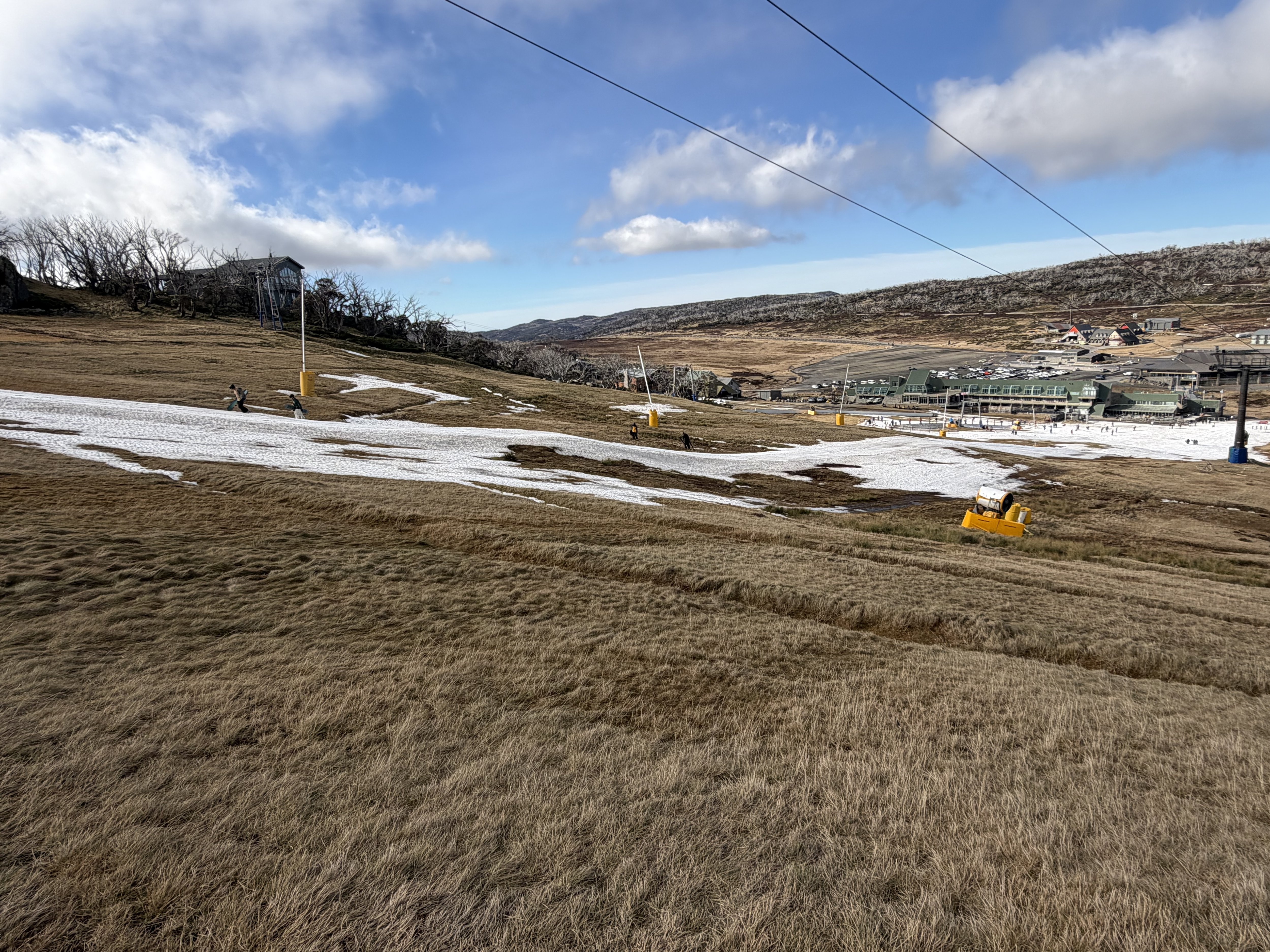Perisher's Front Valley slopes devoid of anything but tiny patches of snowmaking snow in the last week of June, 2026. Source: Steve Smith